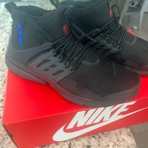 Nike Air Presto Mid Utility Star Wars Darth Vader revamped version .
